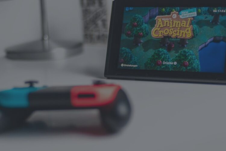 Nintendo Switch with Animal Crossing on the screen